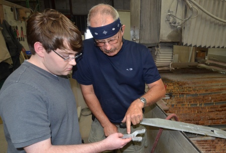 Al Ely (ADR Hydrocut) teaching Nick the finer points of designing for waterjet cutting