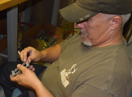 Rob, our machinist, putting the finishing touches on the gloveshot cross member